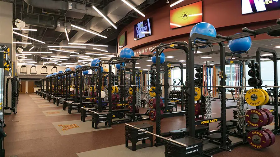 A row of machines in weight room
