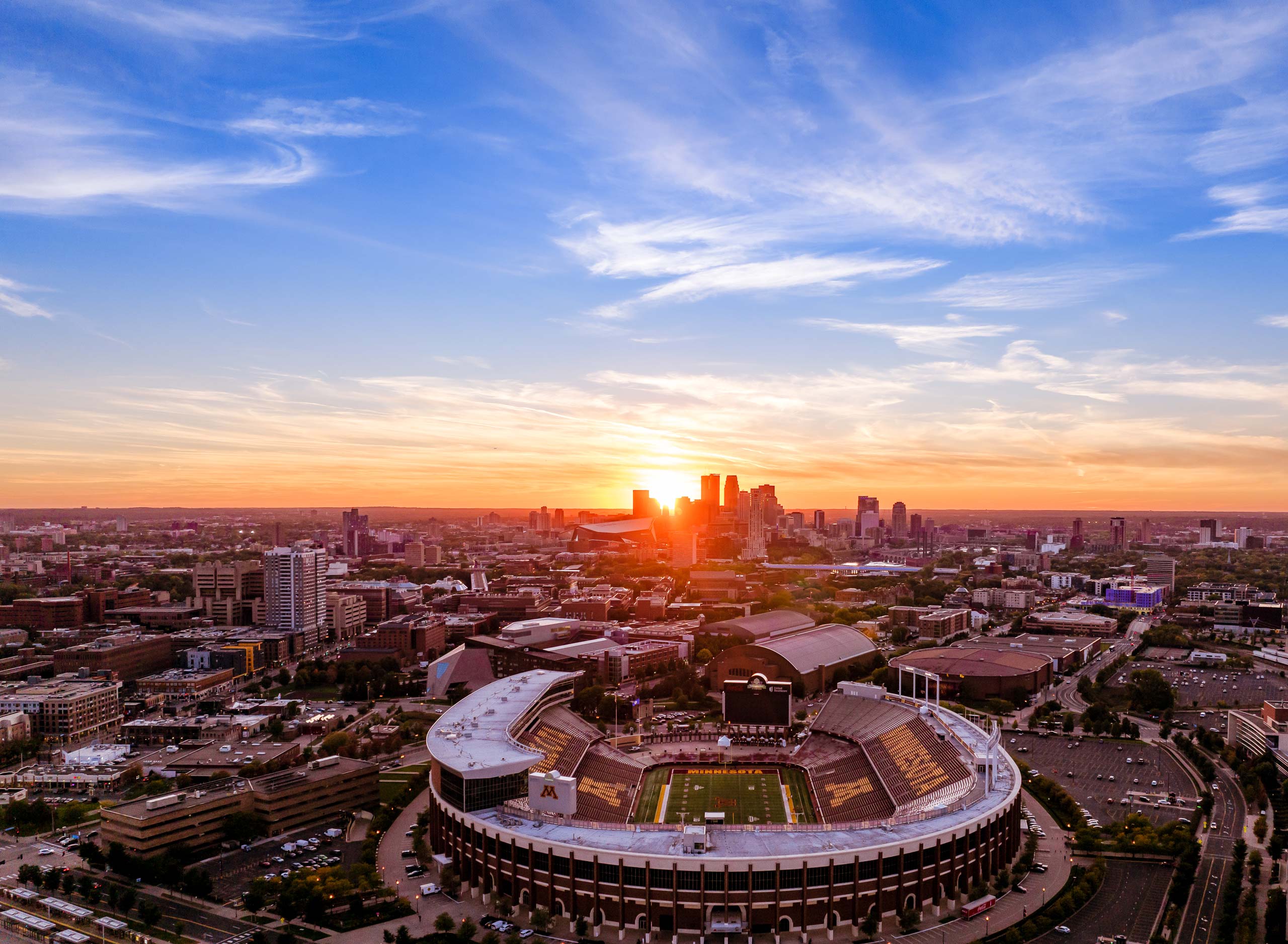 Aerial view of football stadium at sunset
