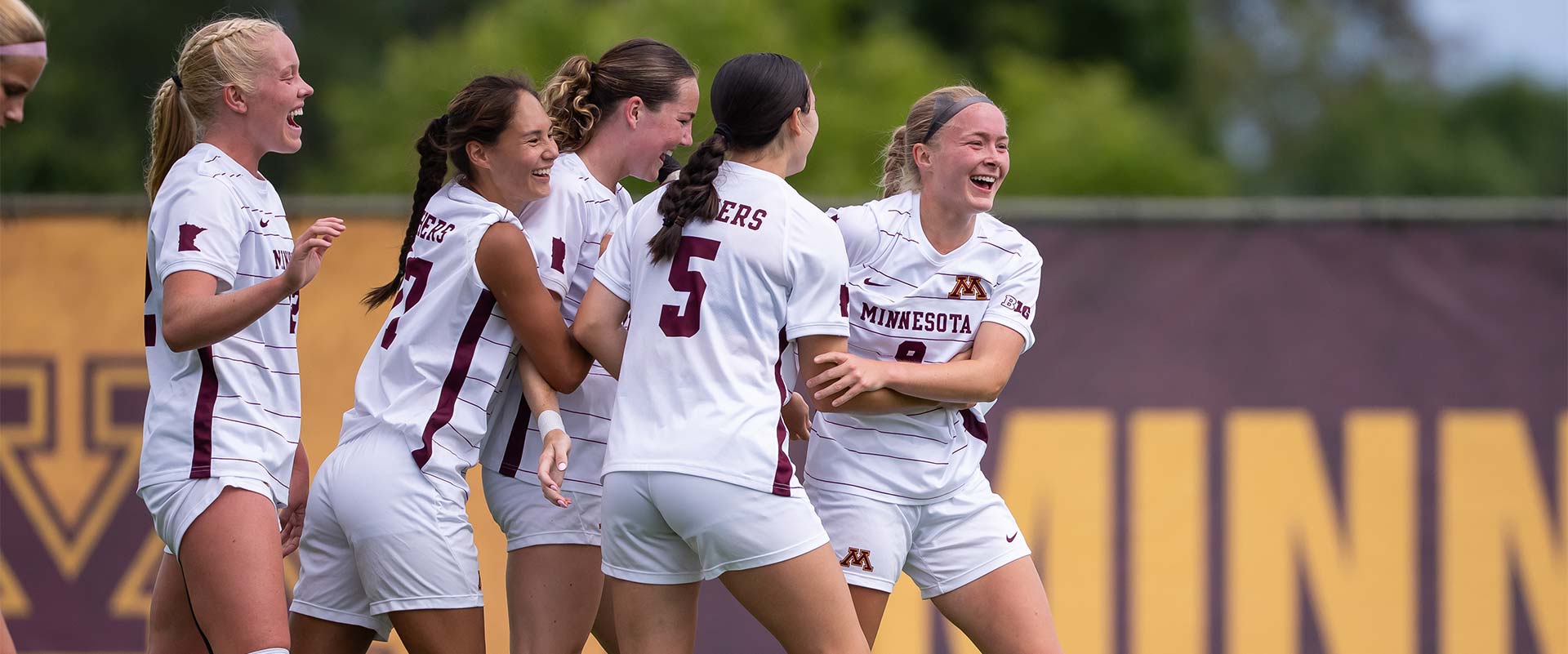 Gopher mascot waving flag