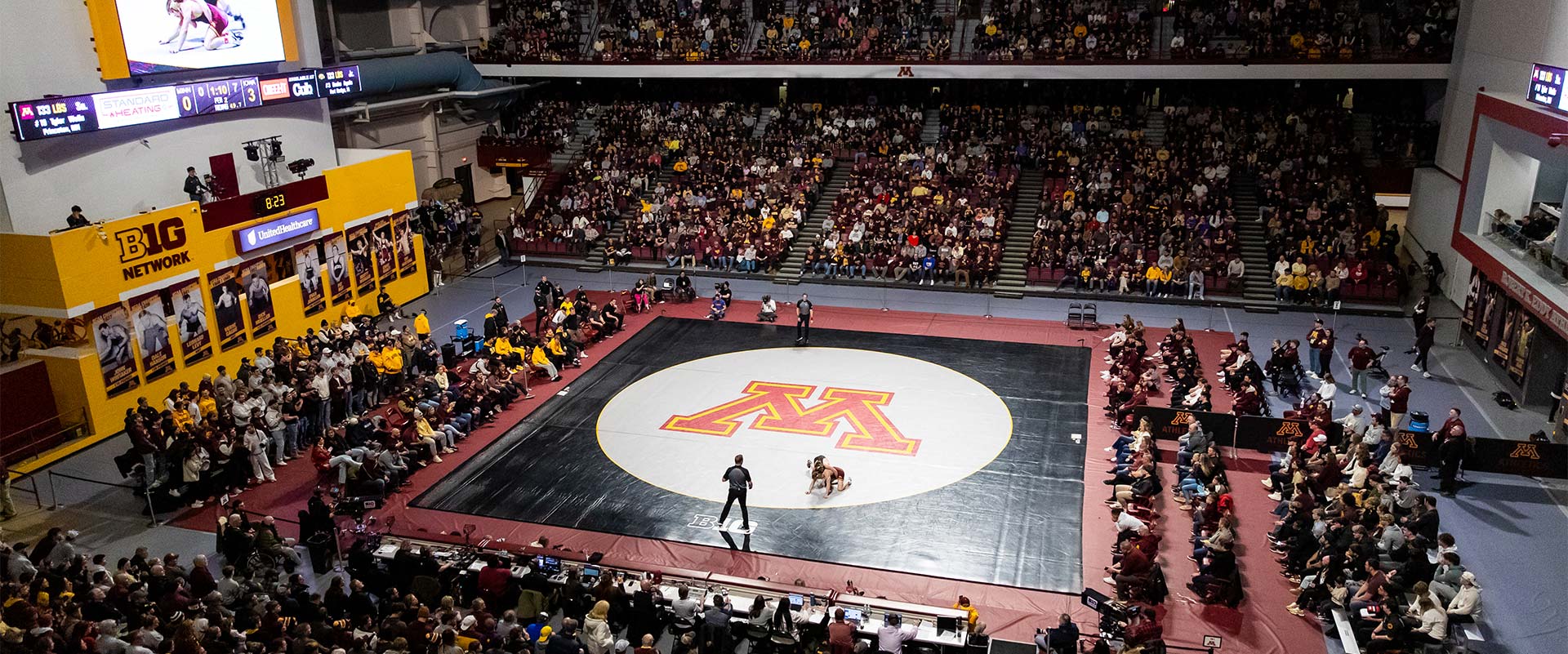 Aerial view of wrestling stadium full of fans
