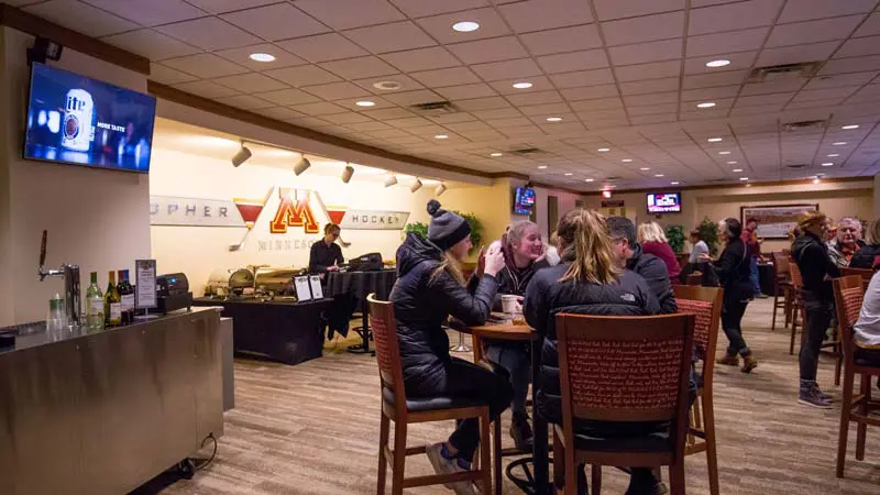 People sitting at a table in the club area