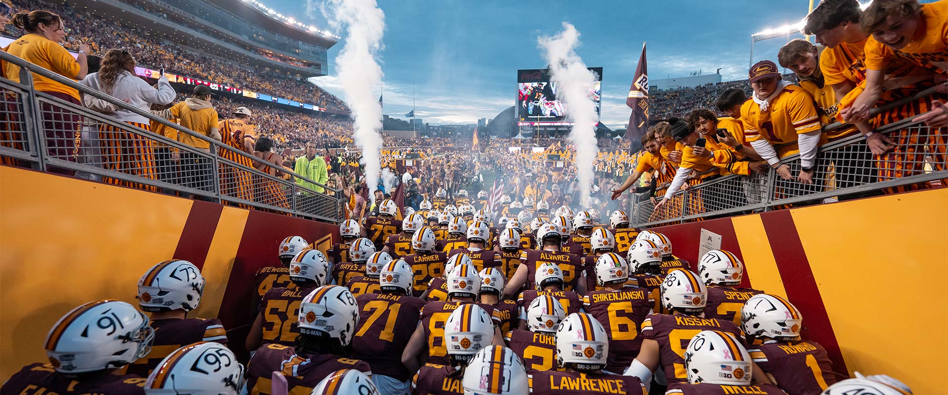 Football team coming out of tunnel